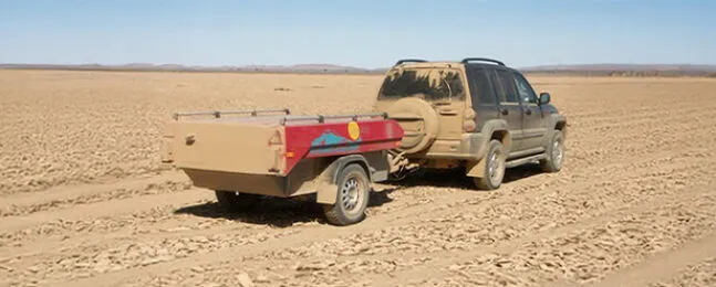 Aart Kok Zambezi tenttrailer vouwwagen op weg modder Marokko cover