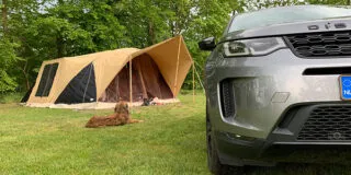 Aart Kok Livingstone River Lodge vouwwagen op camping met Land Rover Discovery