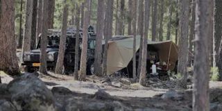 Aart Kok Zambezi River Lodge hardtop Tenttrailer in het bos